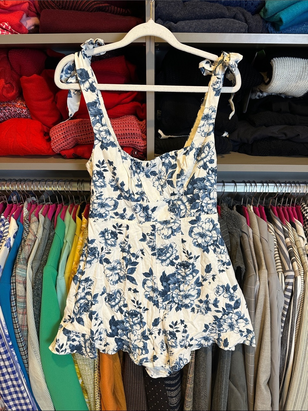Honey & Sparkle white/blue floral adjustable strap lined back zipper romper S